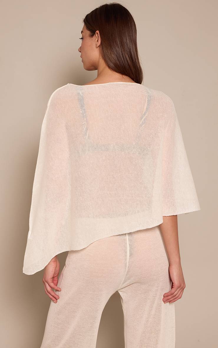Crème Haut Poncho Drapé En Maille Transparente