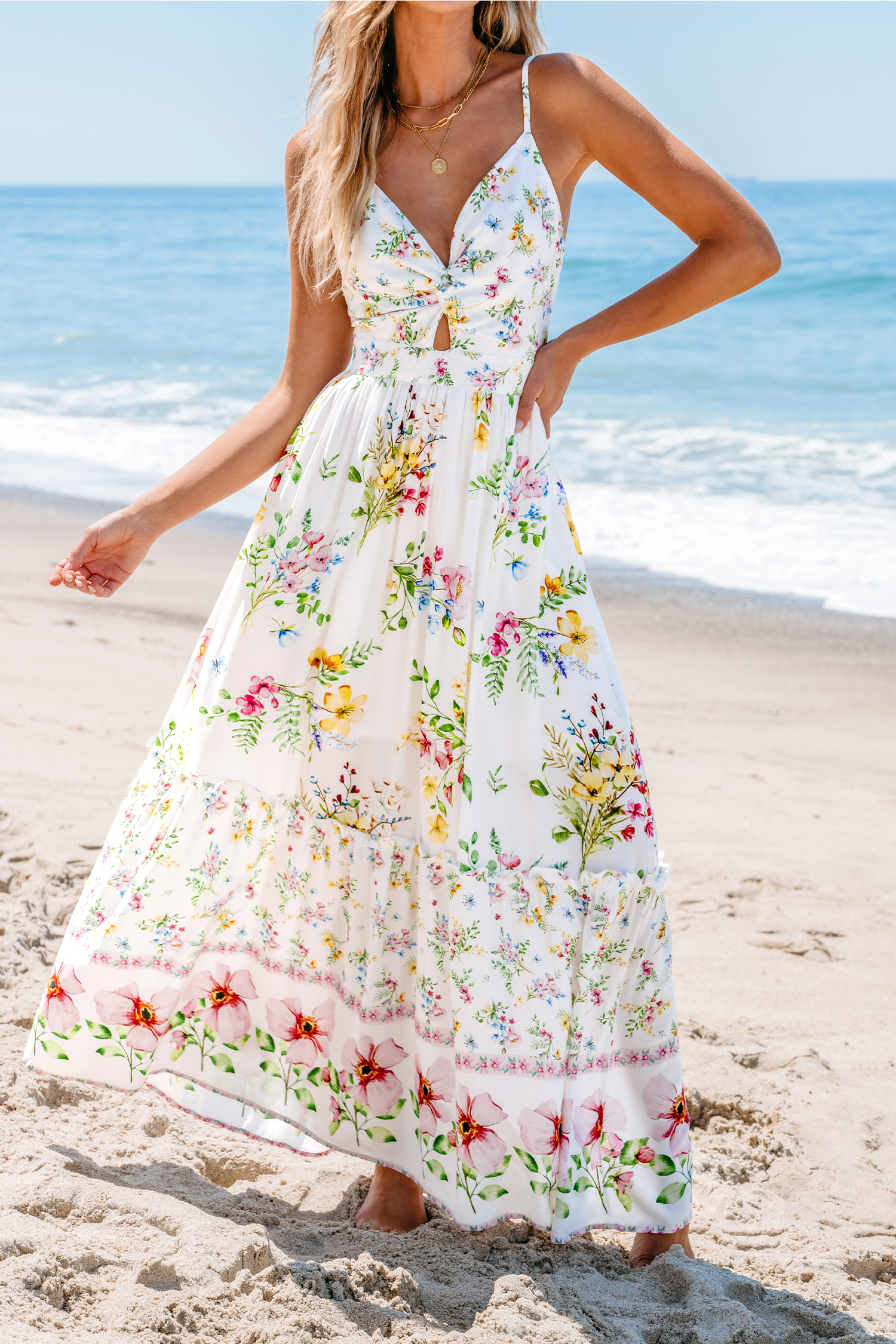 Robe maxi découpée et torsadée à imprimé floral