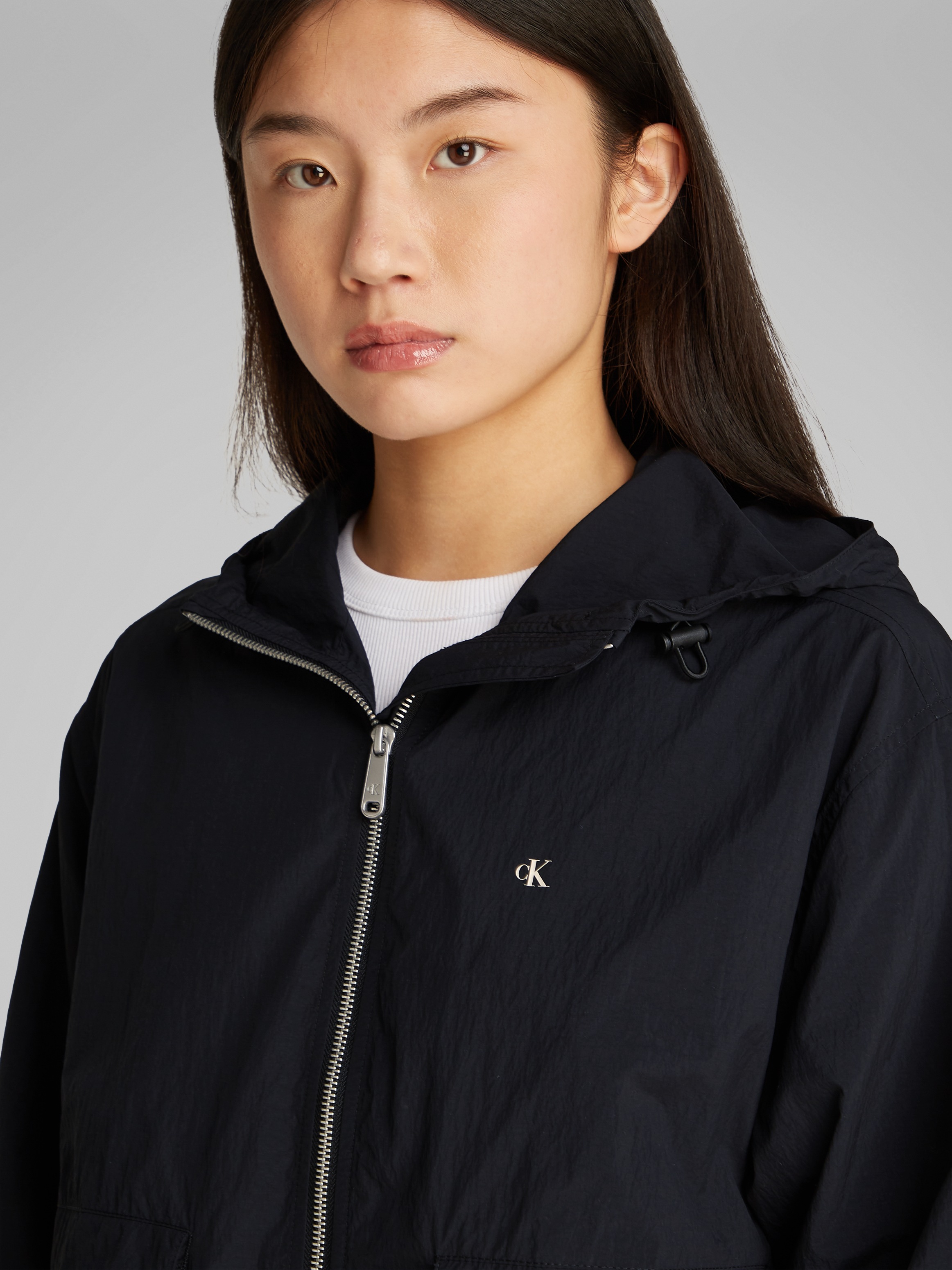 Calvin Klein Jeans Windbreaker »COTTON NYLON WINDBREAKER JACKET« mit Kapuze mit Logodruck