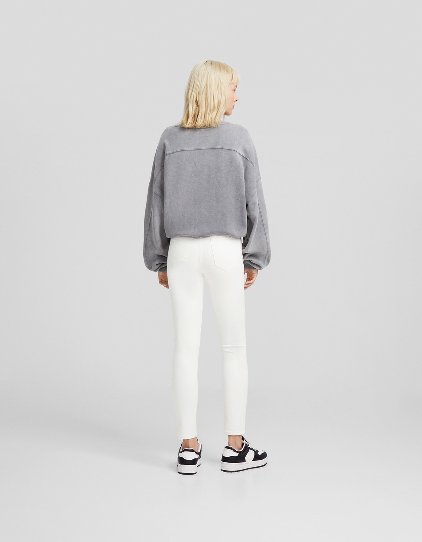calça jeans skinny de cintura super alta