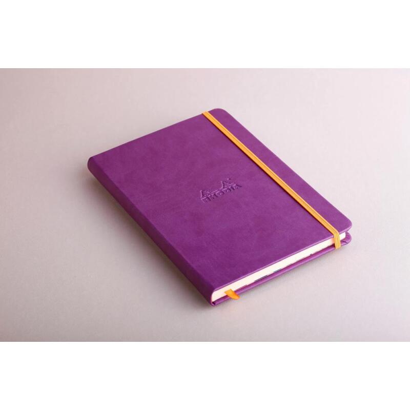 Rhodiarama carnet rembordé rigide A5 192 pages ligné papier ivoire 90g fermeture élastique - Violet