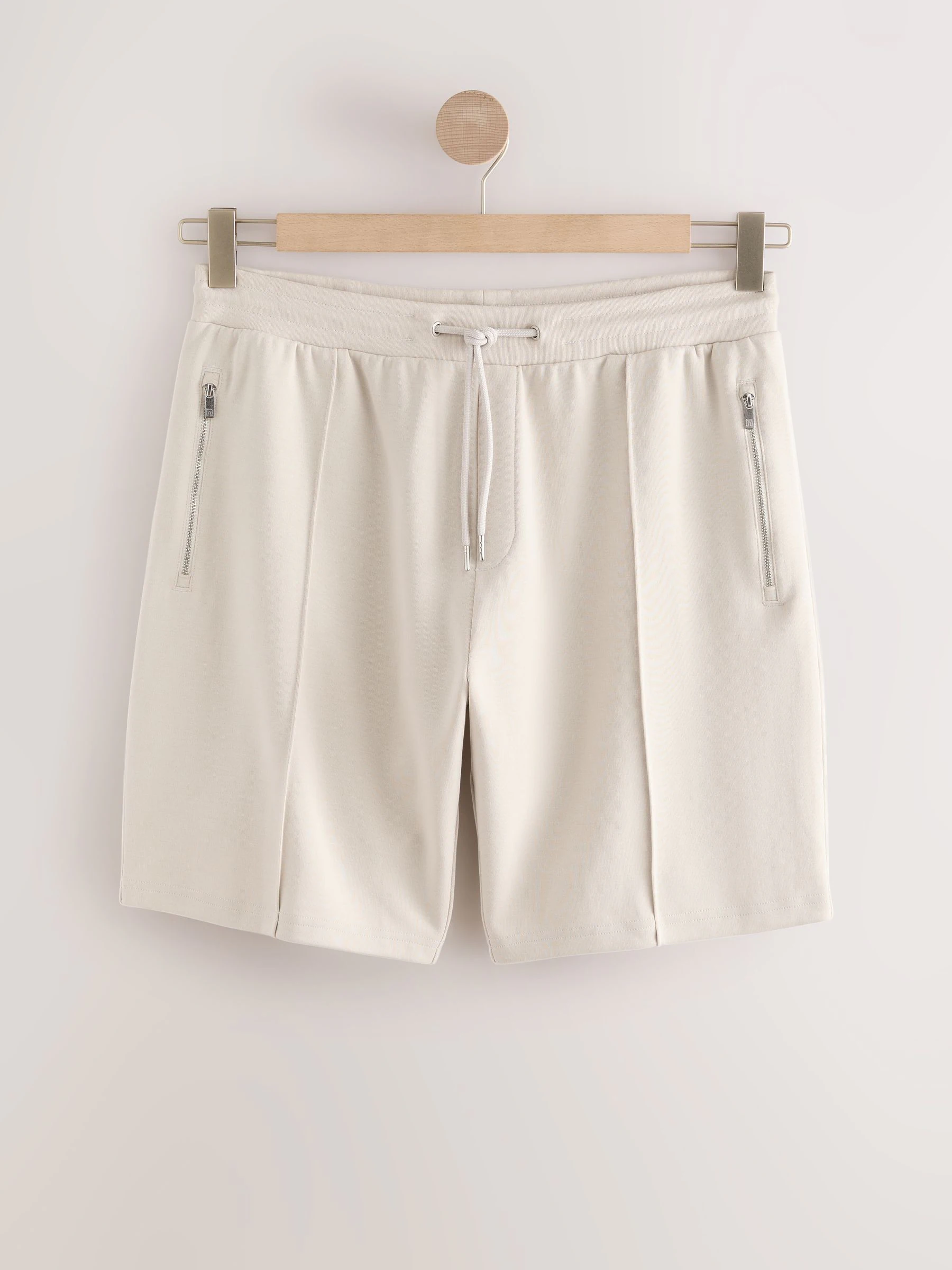 Pastelgeel - Slim-fit jersey shorts met slimme ritszakken