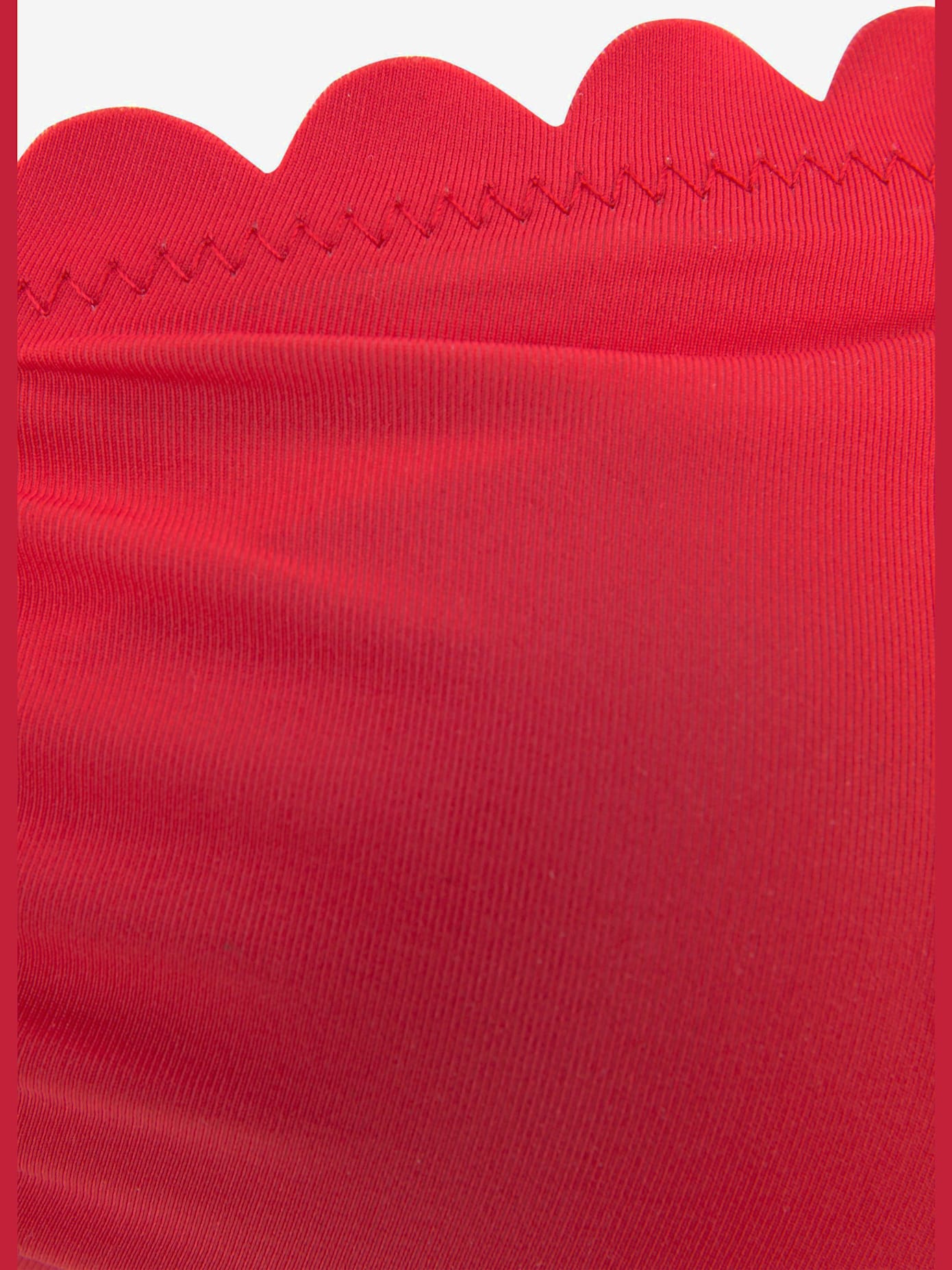 Haut de maillot de bain bandeau bords ondulés au laser