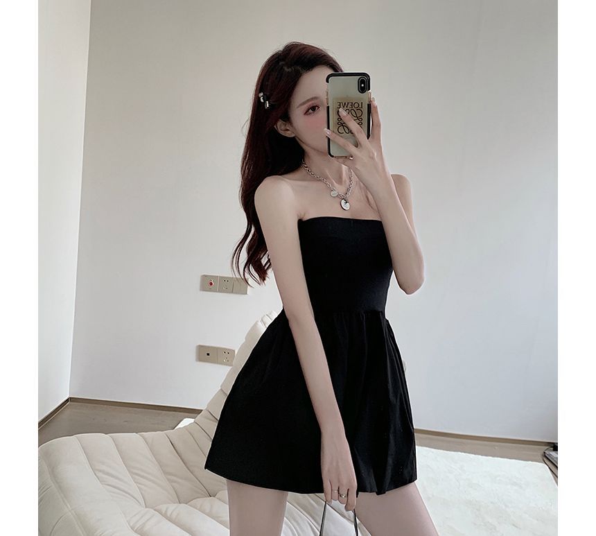 Cerauno - Strapless romper met wijde pijpen