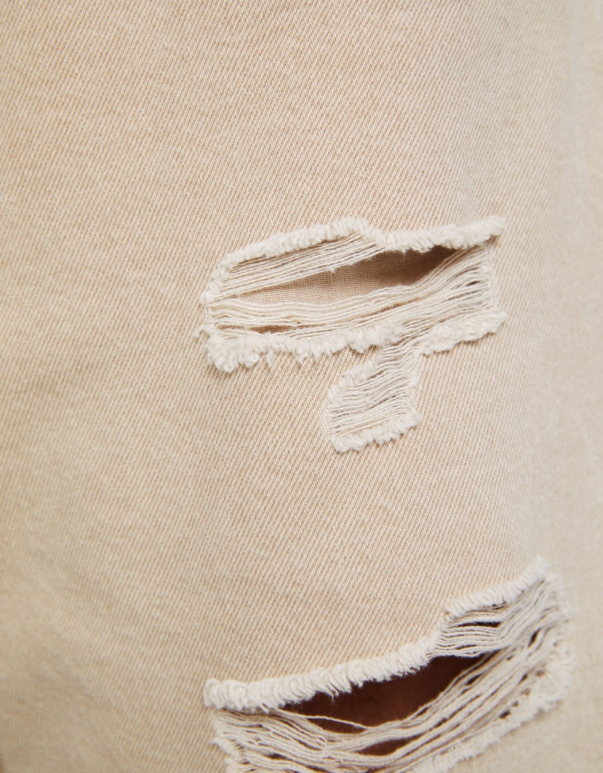 Bermuda jeans rasgada