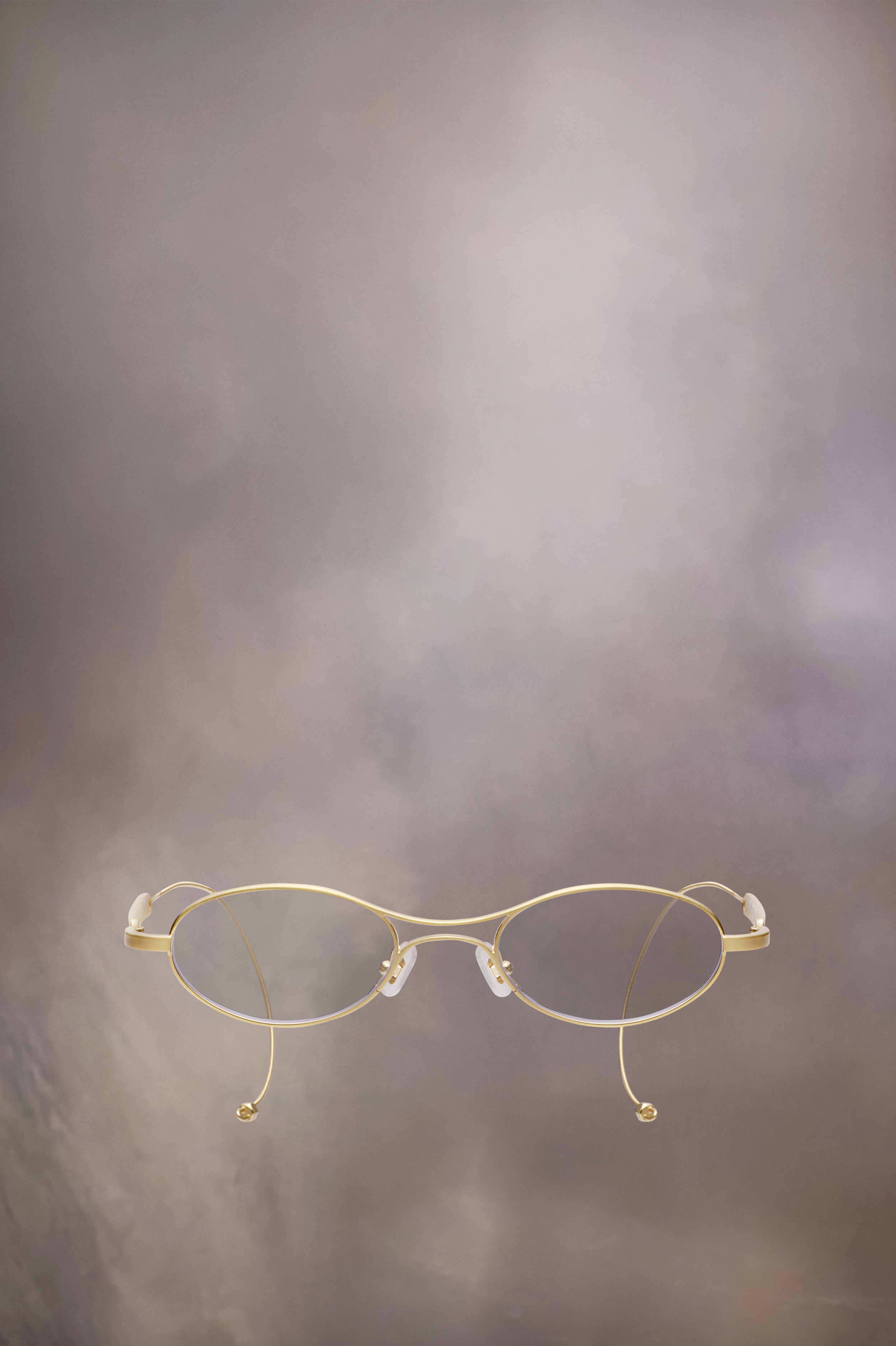Lunettes ovales dorées x Gentle Monster​