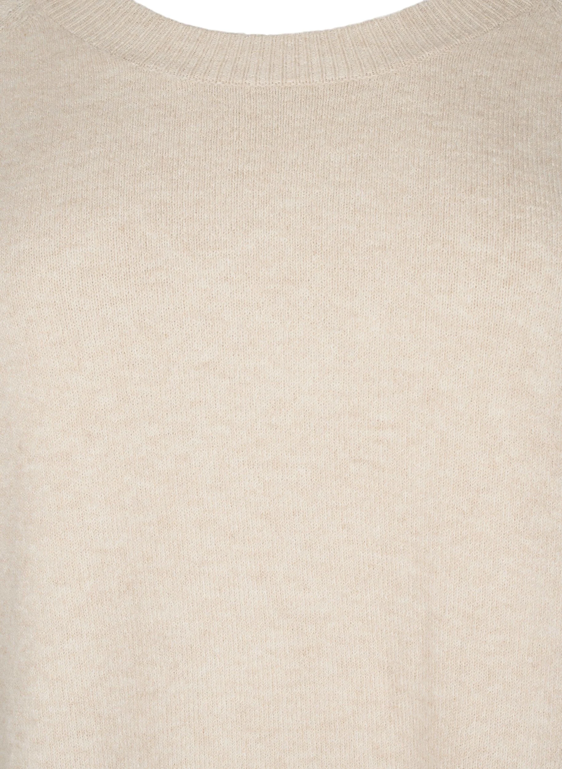 Strikbluse med perledetaljer