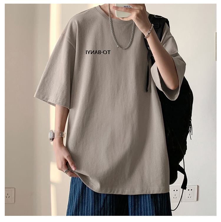 Bay Go Mall - T-shirt met ronde hals en elleboogmouwen en belettering