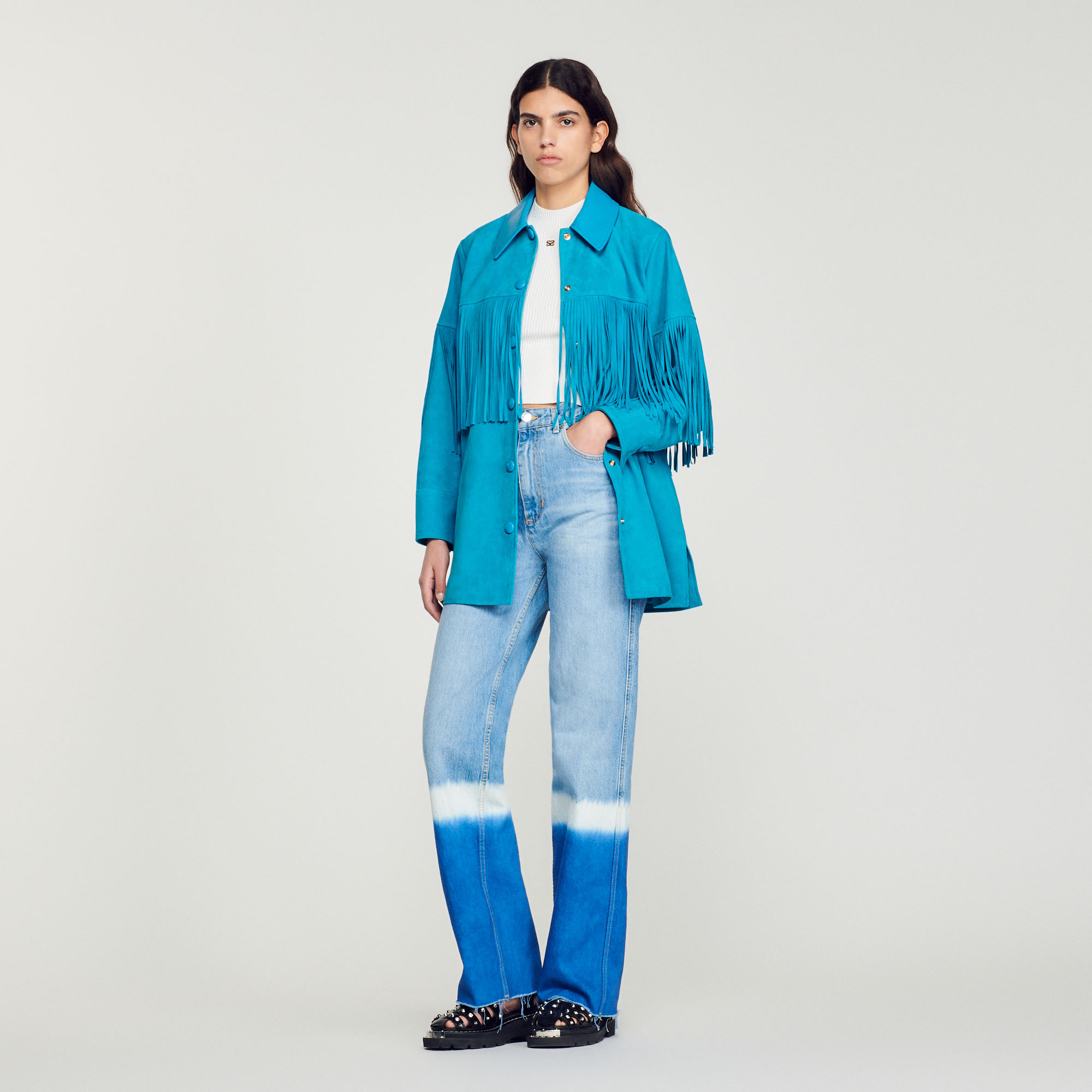 Veste longue en cuir á franges