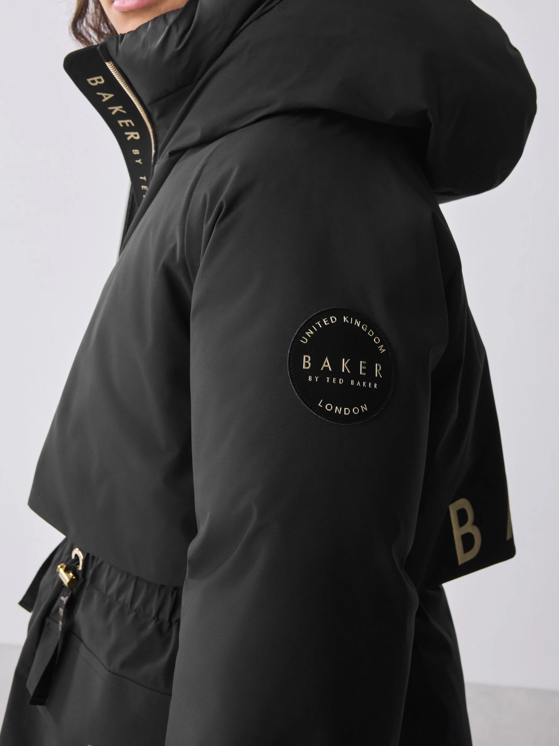 Baker by Ted Baker - Regenbestendige zwarte parka met rok