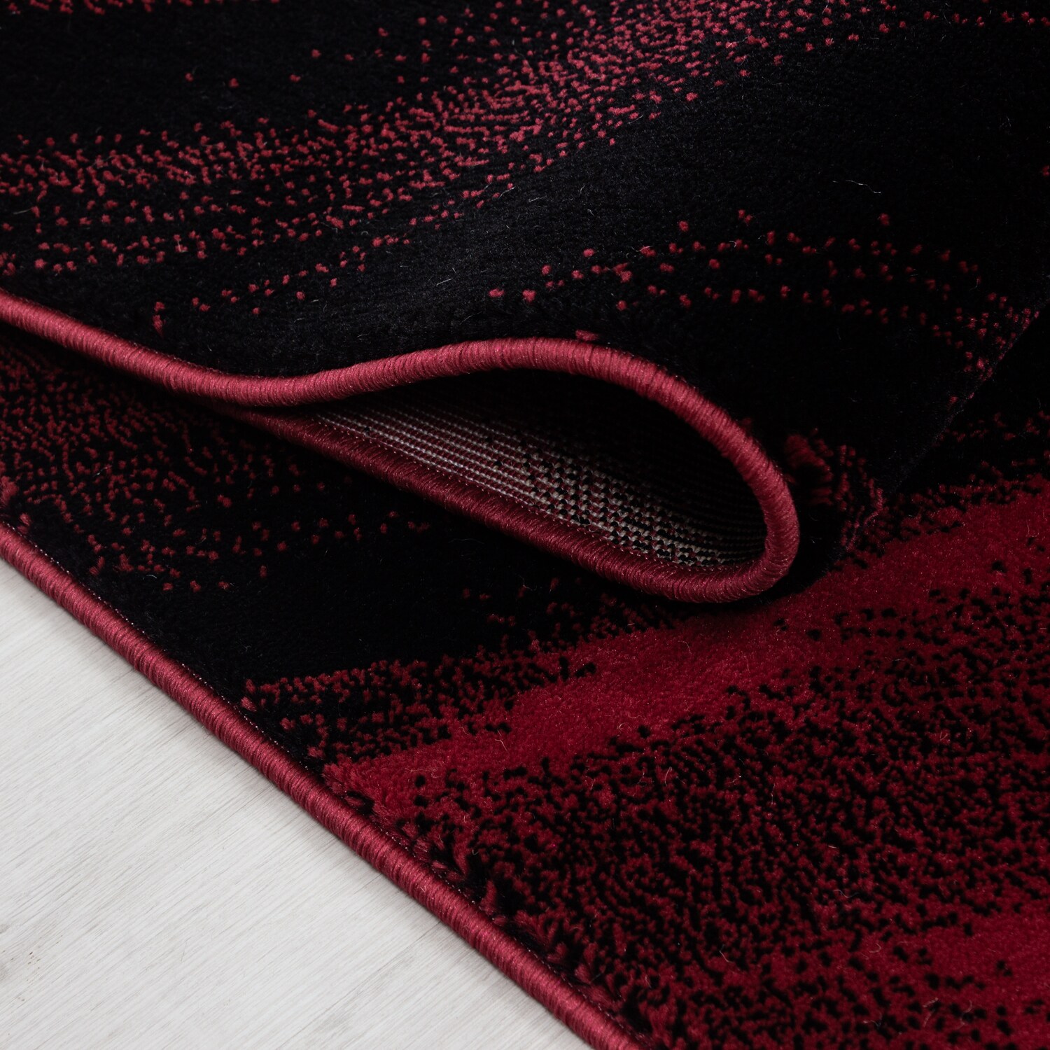 Teppich modern Designer Wohnzimmer Abstrakt Muster Rot oder Schwarz
