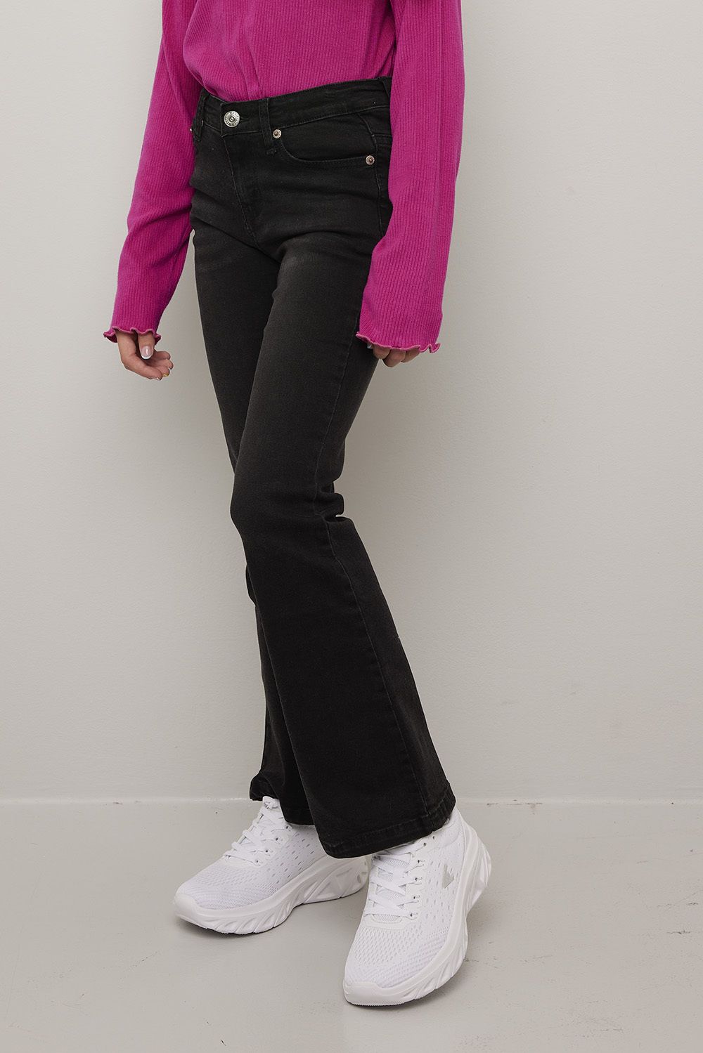 Jeans utsvinget med lavt liv Lina