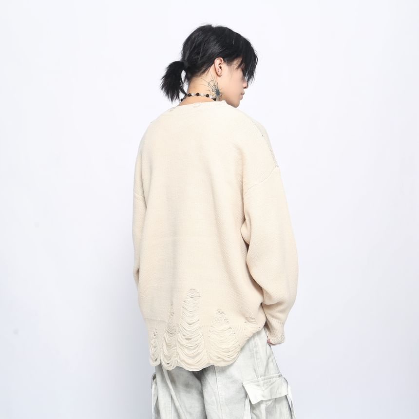 Derbundy - Oversized trui met ronde hals en vlinderprint