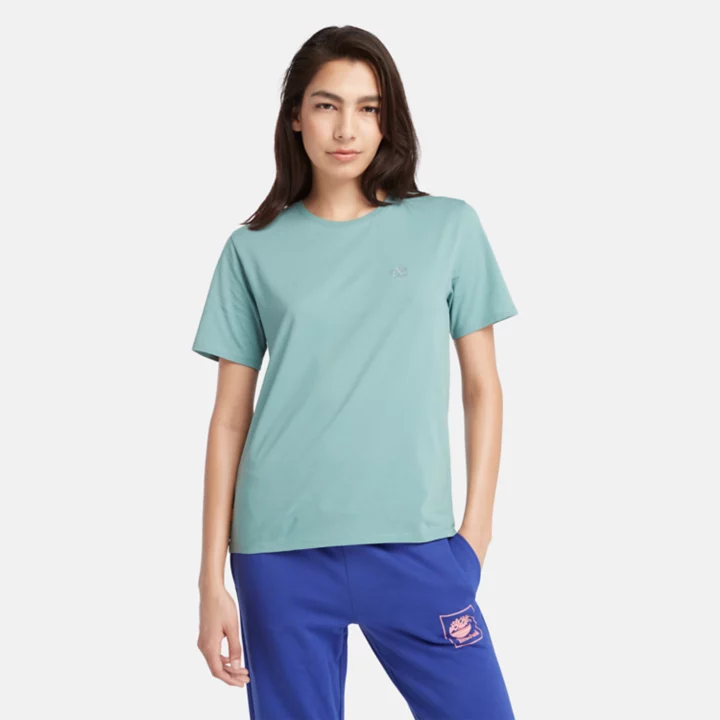 Camiseta feminina Exeter River na cor verde-azulada.