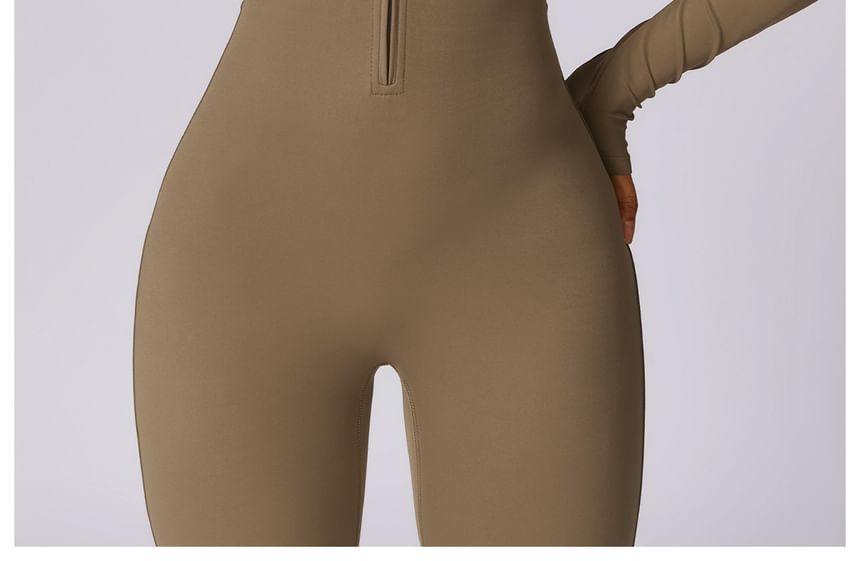 Skinniano - Sportjumpsuit met lange mouwen en halve rits