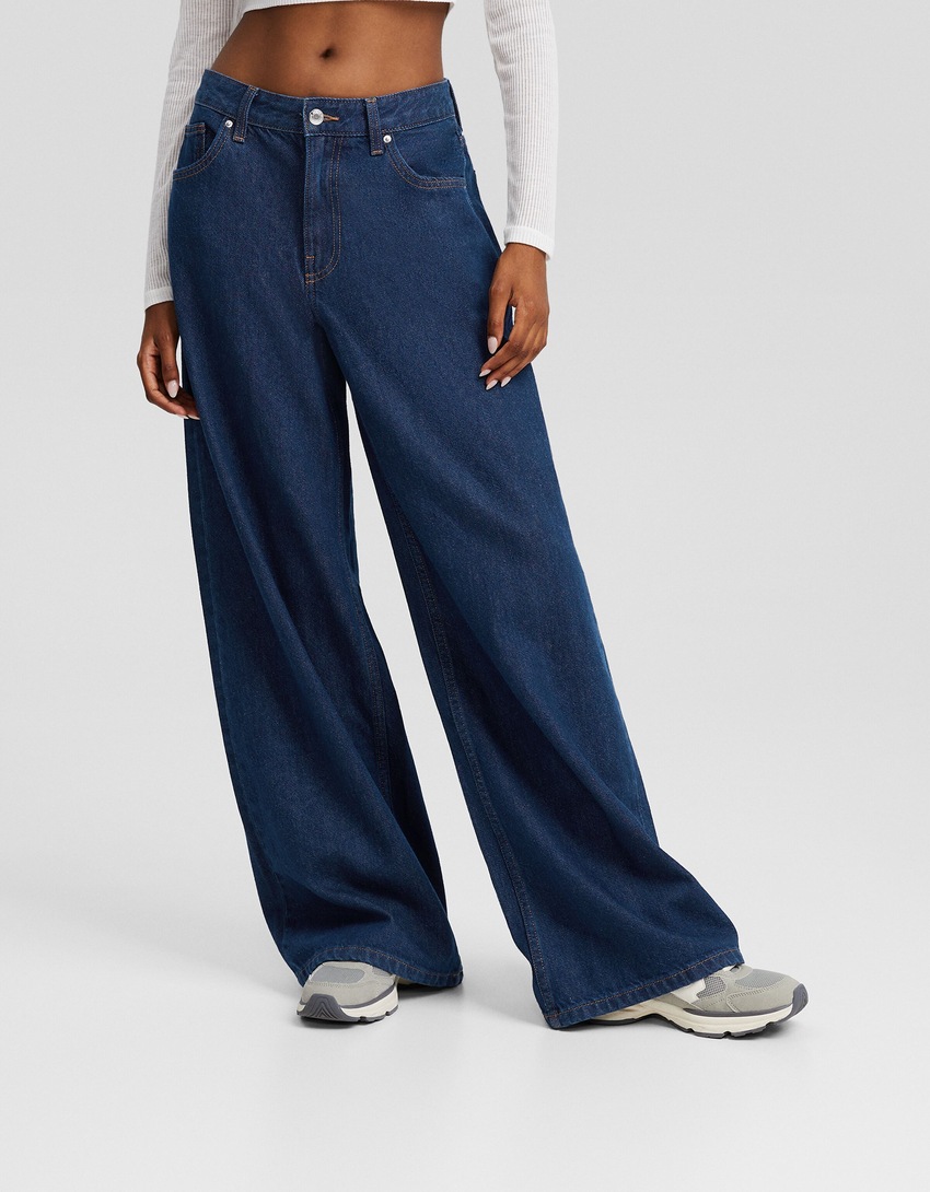 calça jeans de perna larga