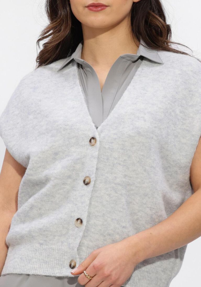 lichtblauwe knit-ted vest marble