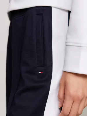 Calça de moletom esportiva de cintura média com listras contrastantes