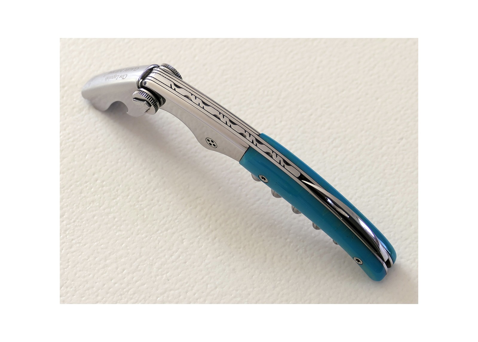 Sommelier Laguiole avec un manche en Résine teintée turquoise et mitre inox