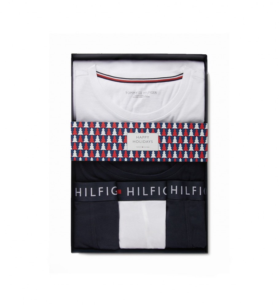Conjunto Tommy Hilfiger com 3 cuecas boxer e 2 camisetas, uma branca e uma azul-marinho.