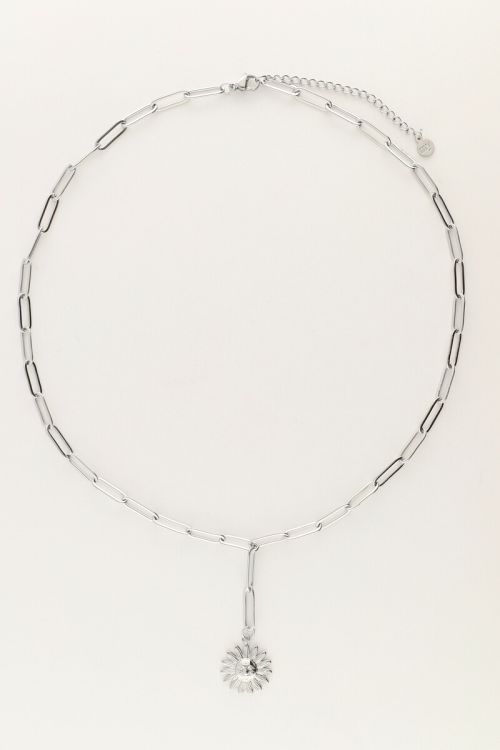 Lange schakelketting met zon
