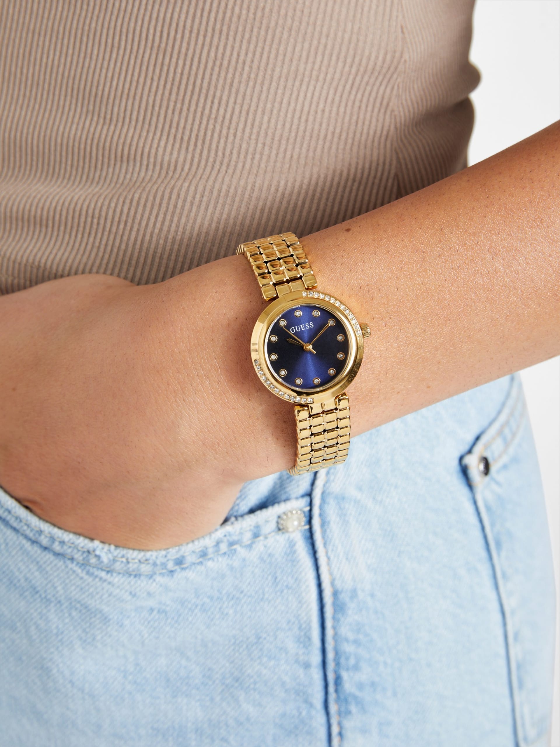 Relógio analógico dourado e azul