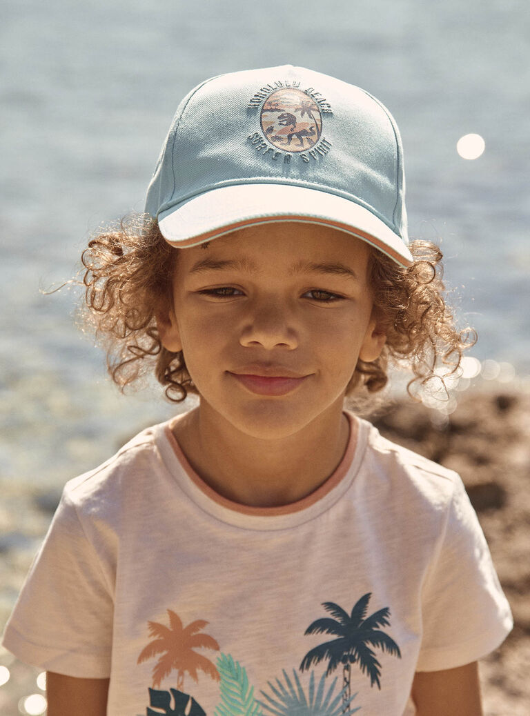 Casquette turquoise en twill à motif dinosaure