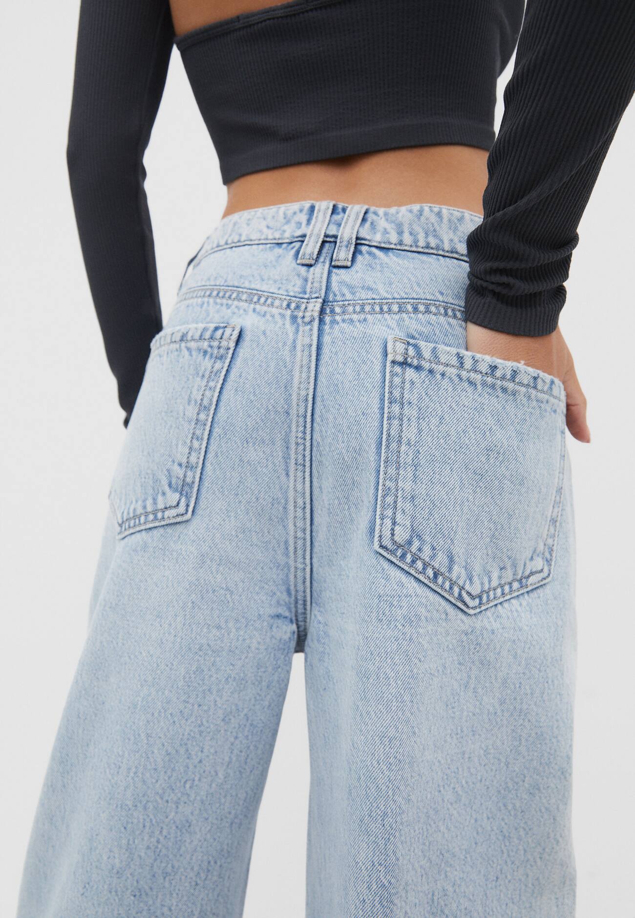 calças jeans de perna larga