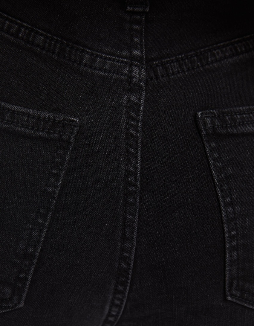 Calça jeans skinny de cintura super alta e rasgada