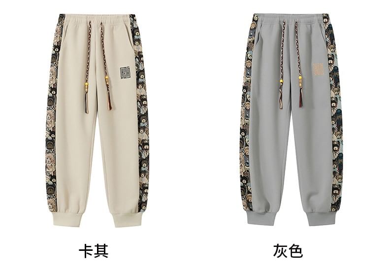 Dandyluxe - Harem-joggingbroek met trekkoord en geborduurde berenprint en wafelmotief