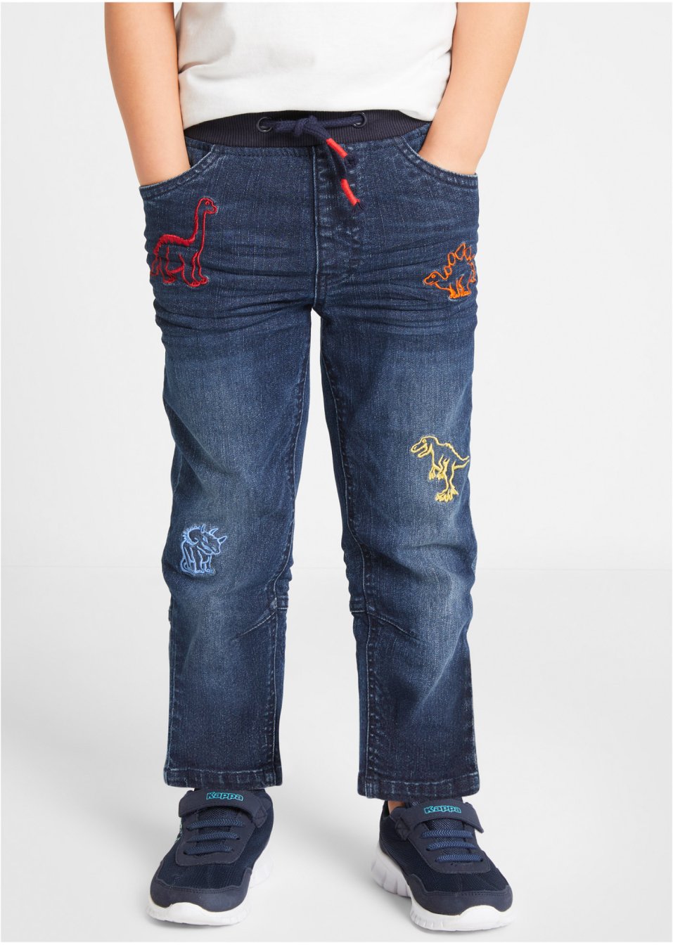 Jean avec motifs dinosaures