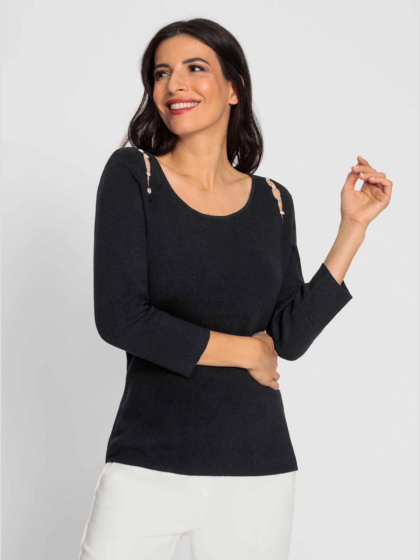 Pull découpes raffinées avec perles décoratives à l'encolure