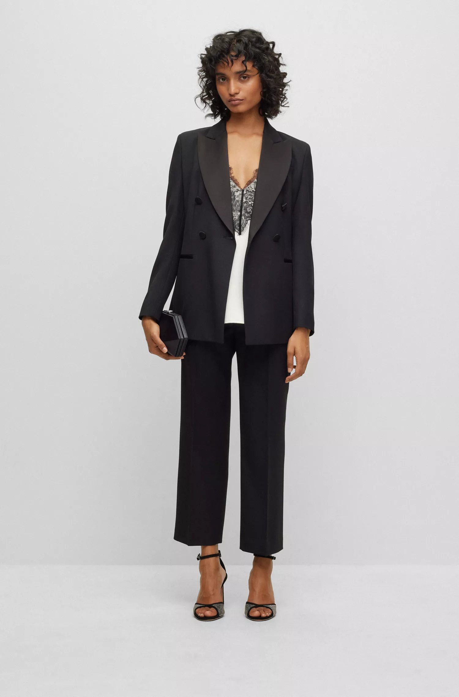 Blazer de smoking BOSS preto, corte slim, em sarja de lã mista.
