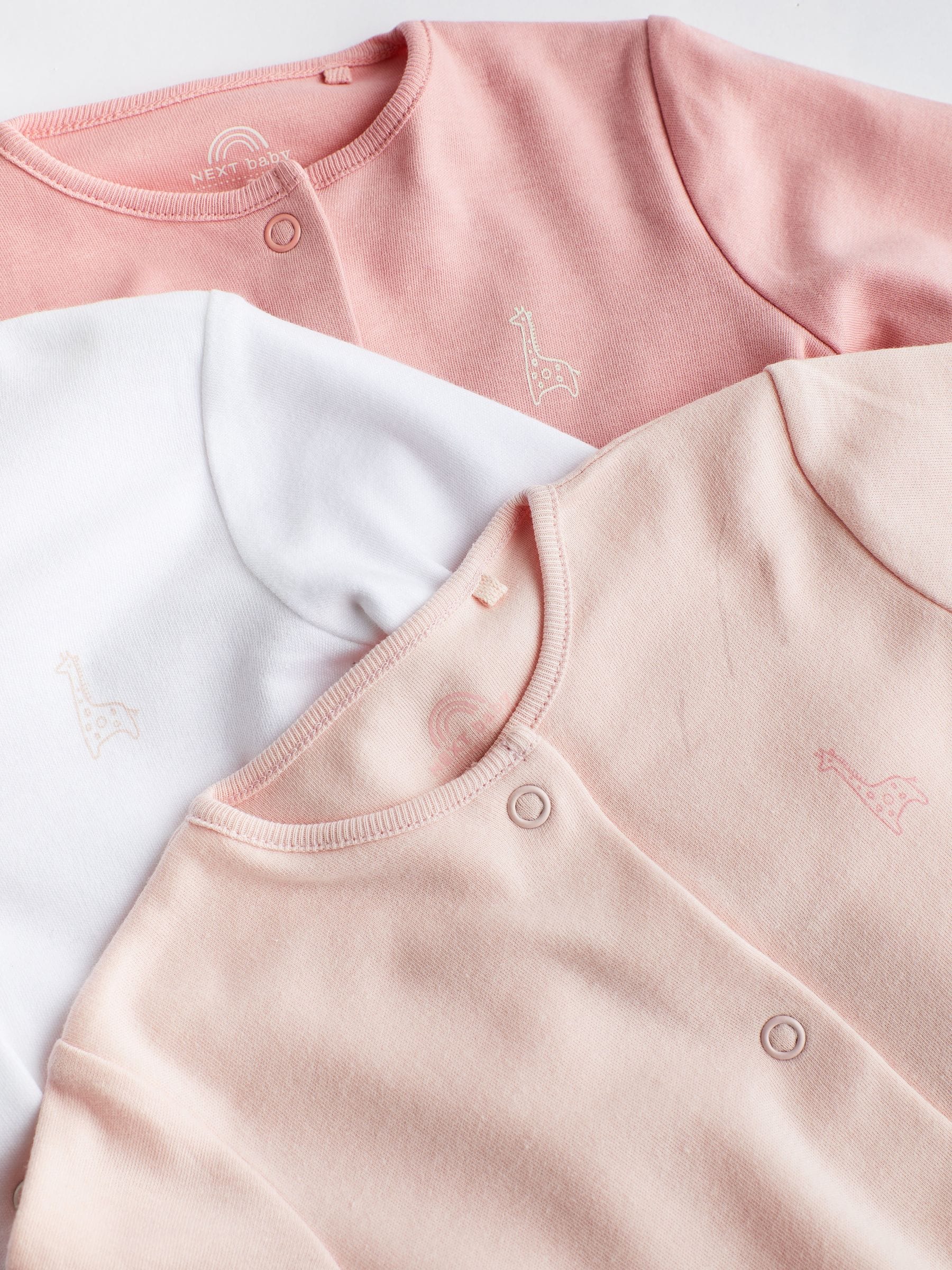 Roze/wit - Babypyjama's (0-2 jr)