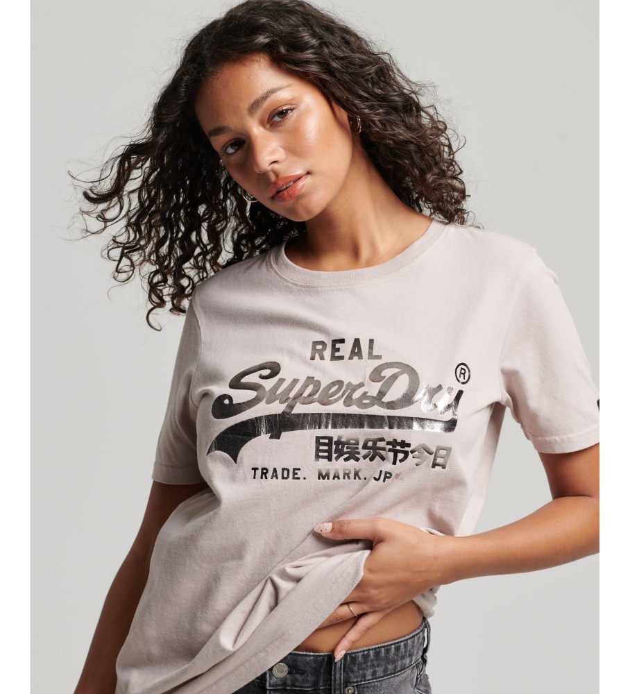 Camiseta Superdry bege com logo vintage e detalhes.