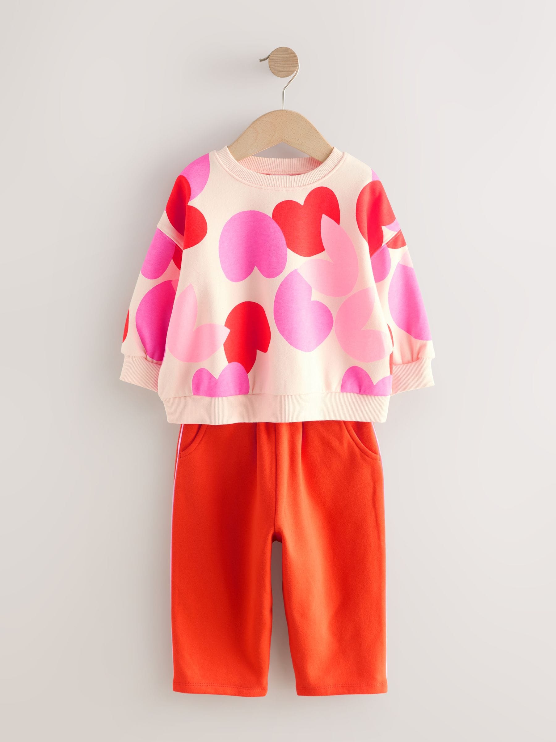 Roze/rood met hart - Set van sweatshirt en joggingbroek met rechte wijde pijpen (3mnd -7jr)