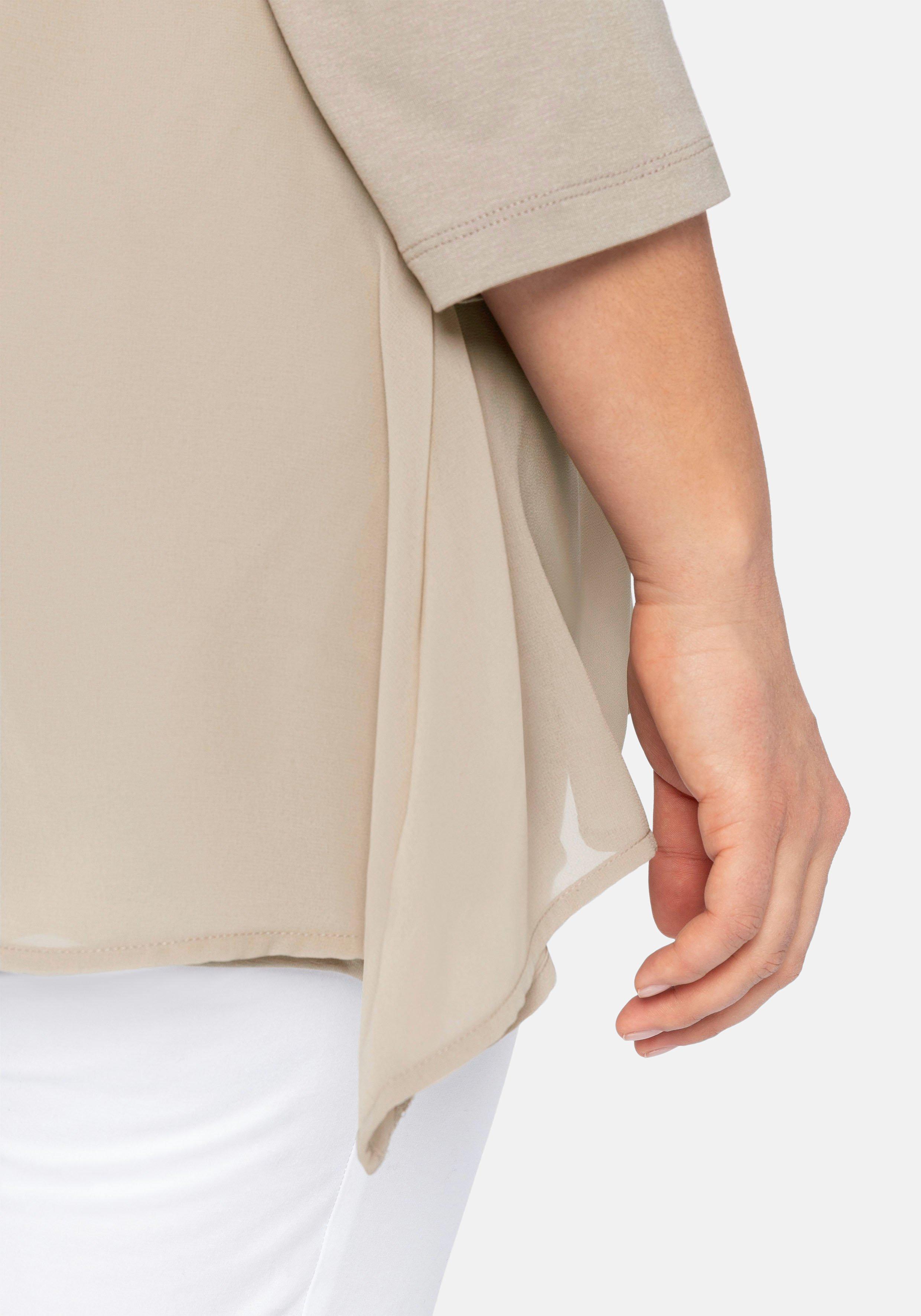 Blusenshirt in leichter A-Linie mit Zipfelsaum