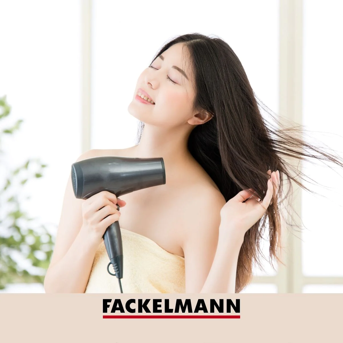 Support sèche cheveux en zinc noir mat New York Fackelmann