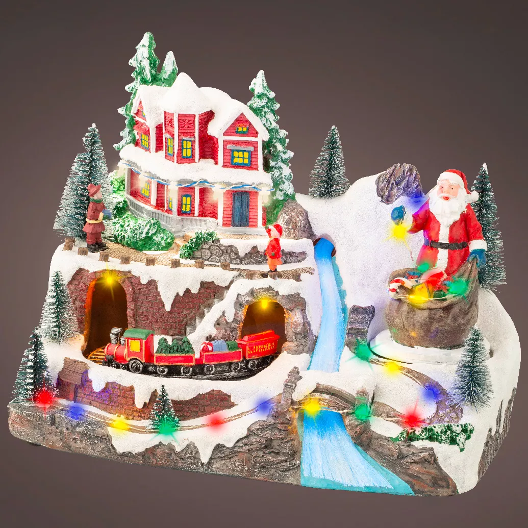 Village de Noël lumineux et musical Père Noël en montagne