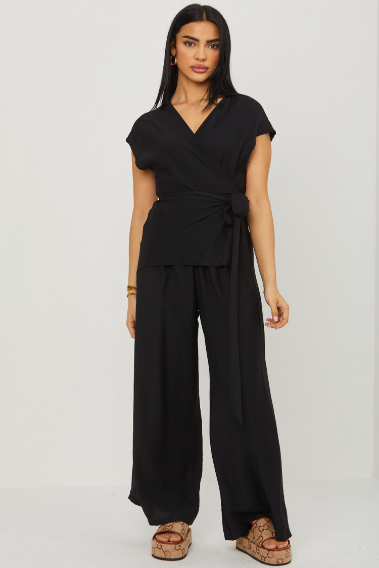 Combinaison pantalon noire décolleté croisé a noué