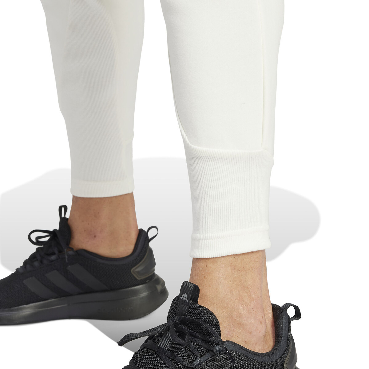 ADIDAS ROUPAS ESPORTIVAS<br>Calças de corrida ZNE