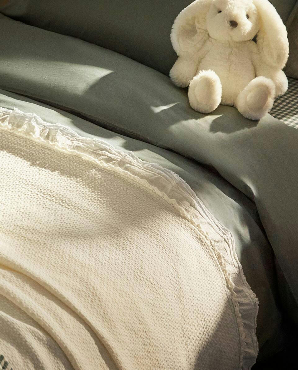 Colcha infantil de crochê jacquard