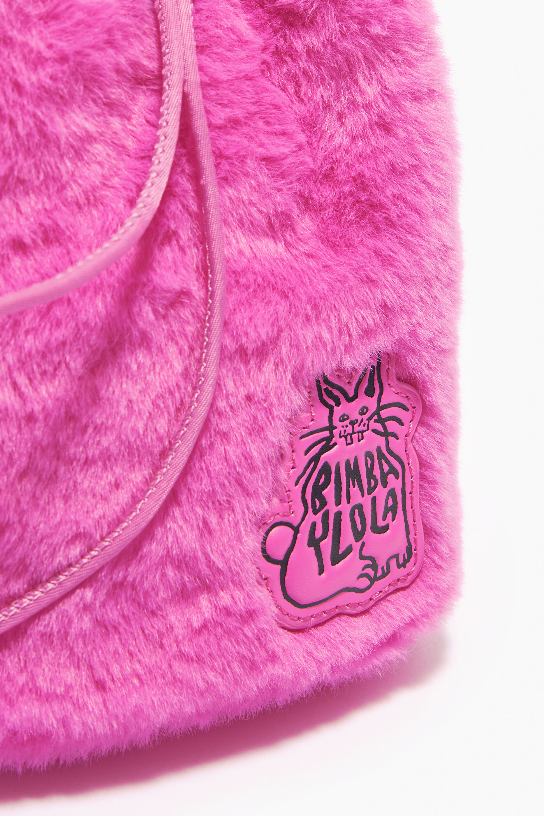 pequena bolsa de cabelo rosa neon com cordão