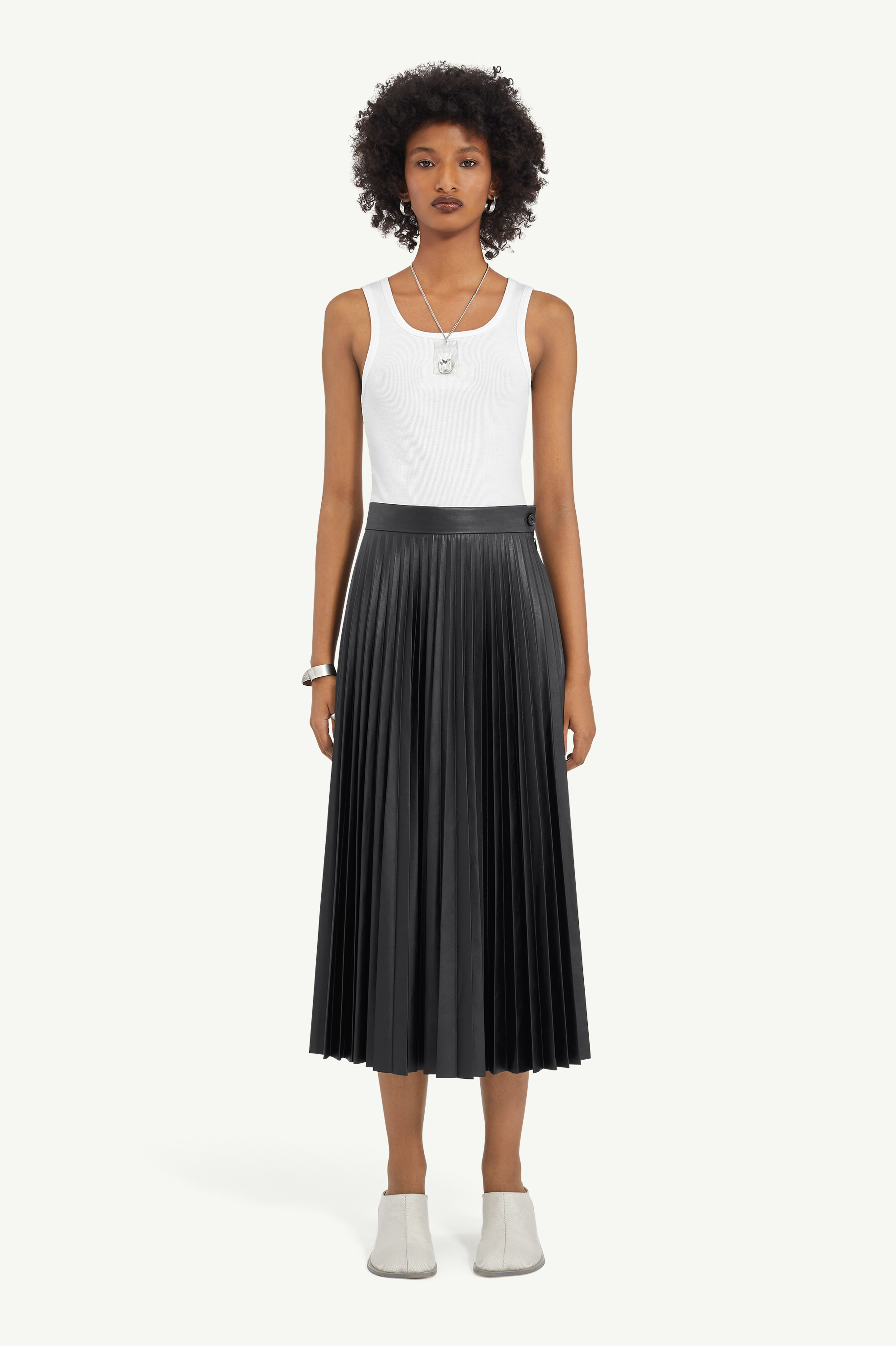 Jupe midi plissée en cuir PU