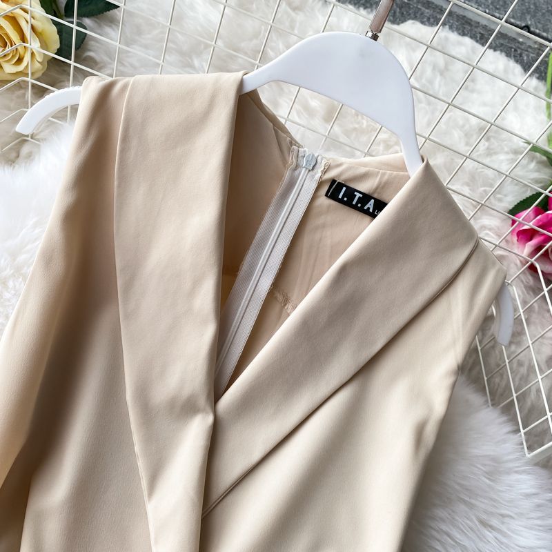 Yearnin - Mouwloze jumpsuit met wijde pijpen en riem