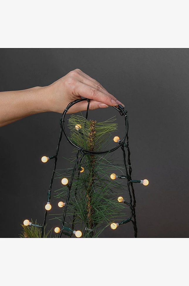 TREE Lyssnor til juletreet