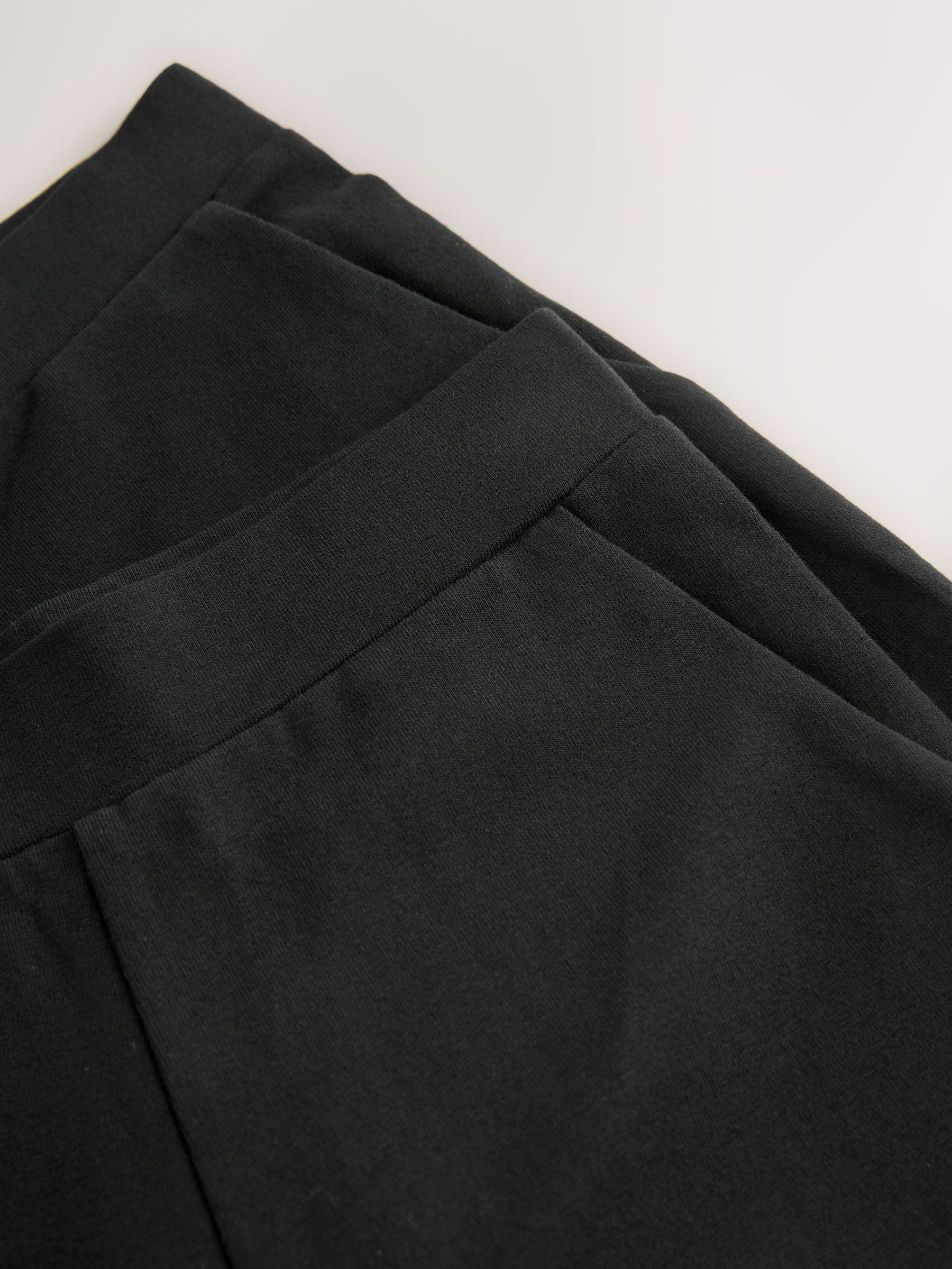 Zwart - Jersey broek met wijde pijpen (3-16 jr)