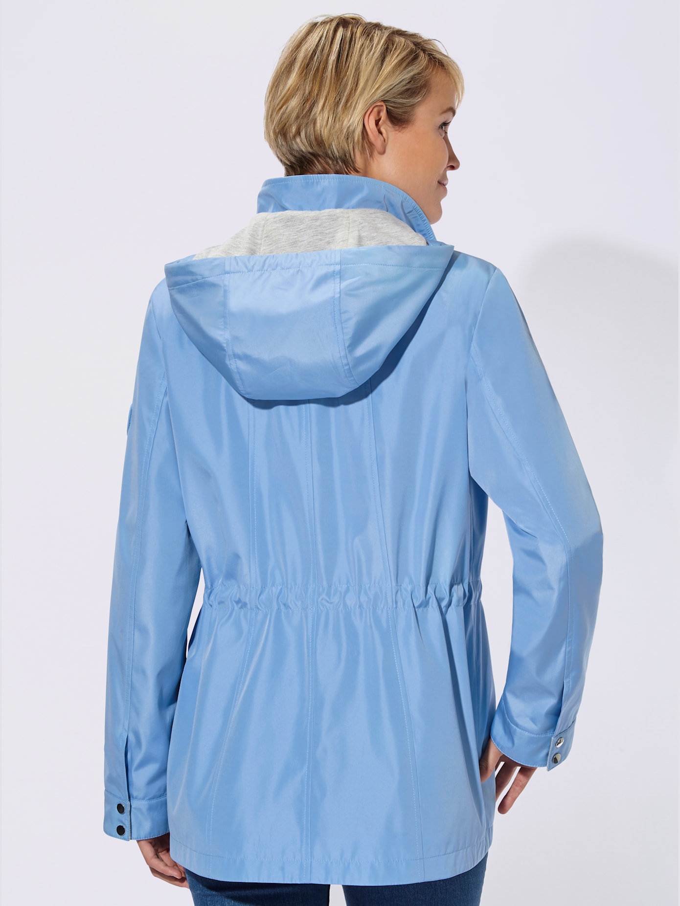 Veste d'extérieur capuche amovible grâce à une glissière