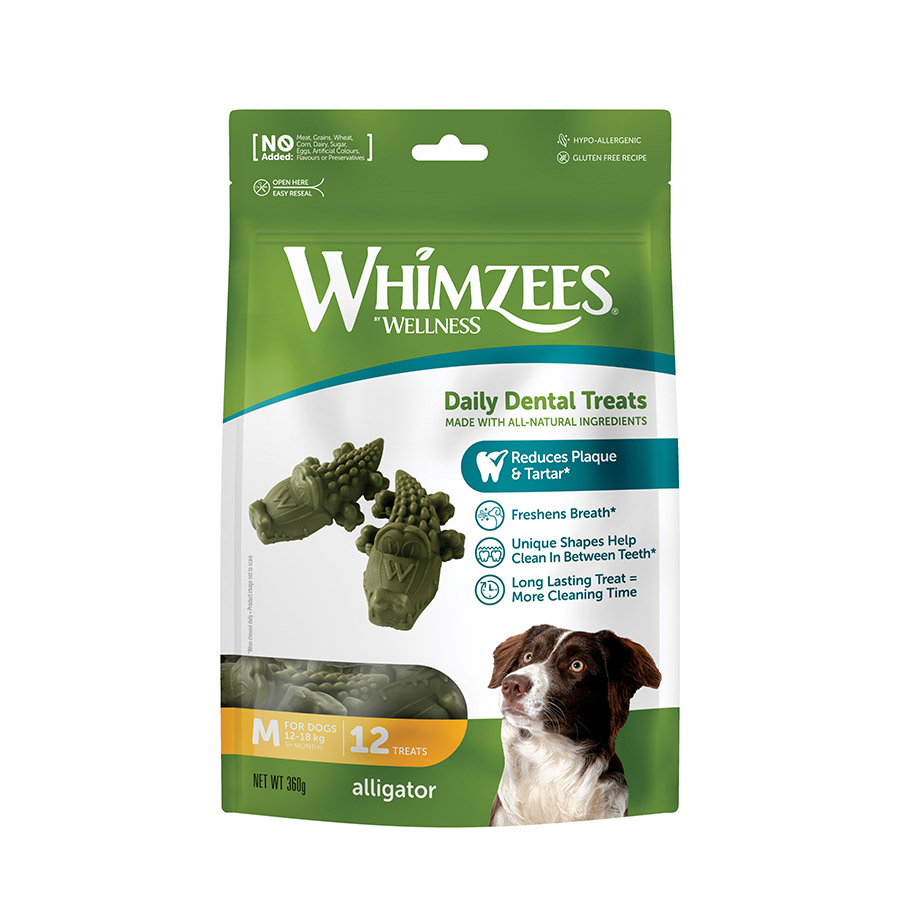 Petiscos dentais Whimzees em formato de crocodilo para cães de porte médio.