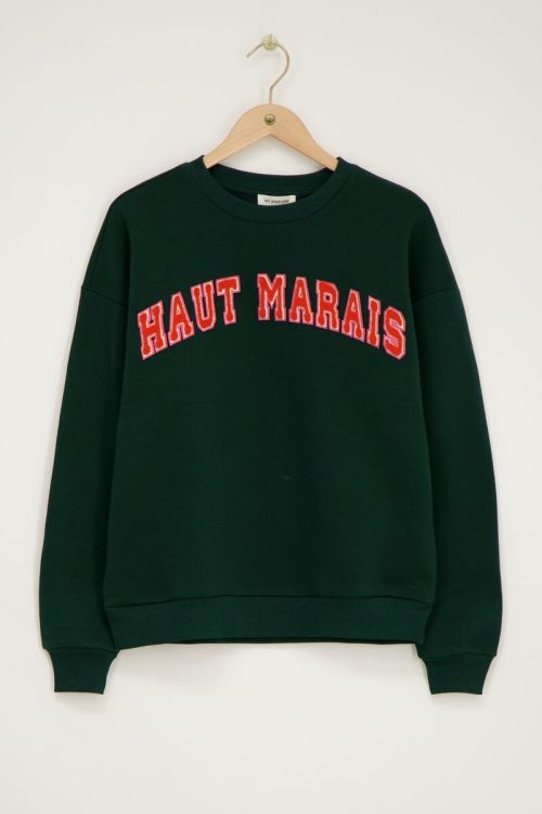 Donkergroene sweater 